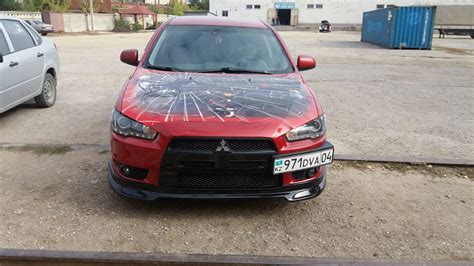 Как найти информацию о цвете экстерьера Mitsubishi Lancer 9 в руководстве по эксплуатации автомобиля